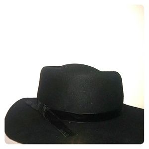 Black flat brim hat with velvet bow